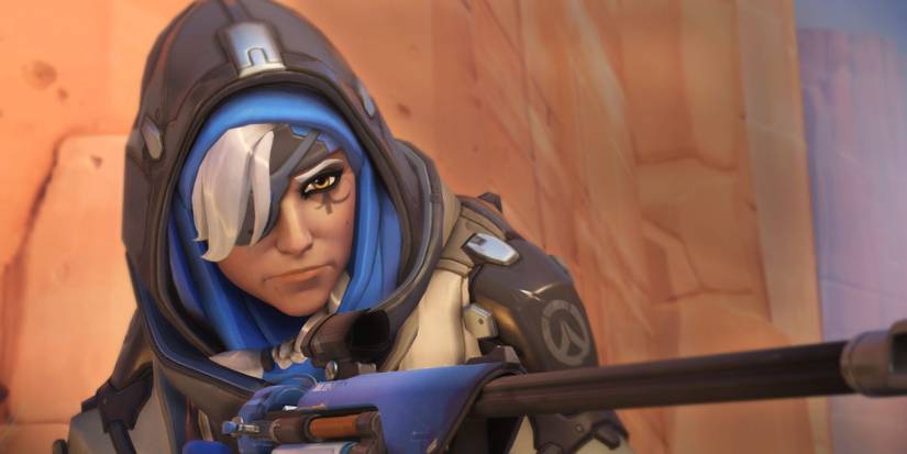 Ana aiming down her sights