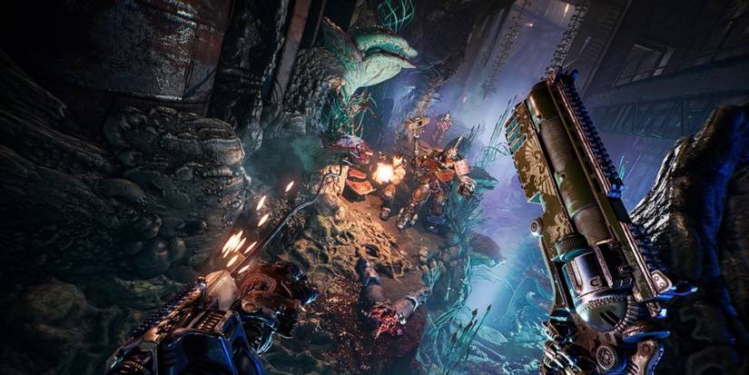First-person view of Necromunda: Hired Gun protagonist engaged in combat