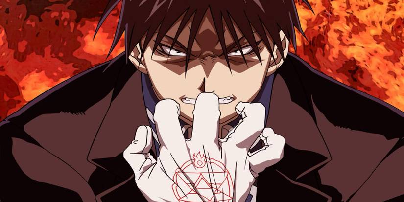 Roy Mustang furieux au milieu des flammes saisissant son gant