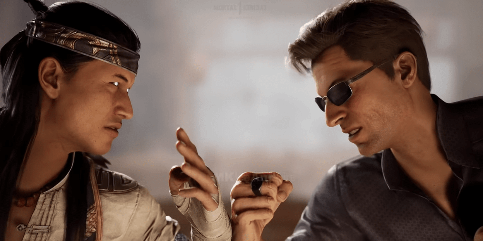 Liu Kang and Johnny Cage fist bump before a battle in Mortal Kombat 1.