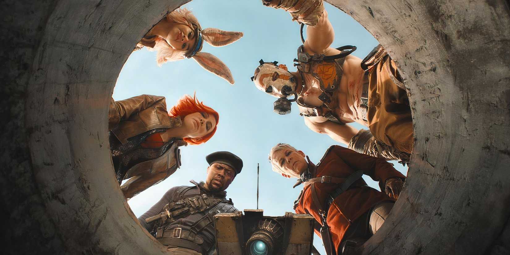 Promotional still from the Borderlands movie of characters looking down a pipe.