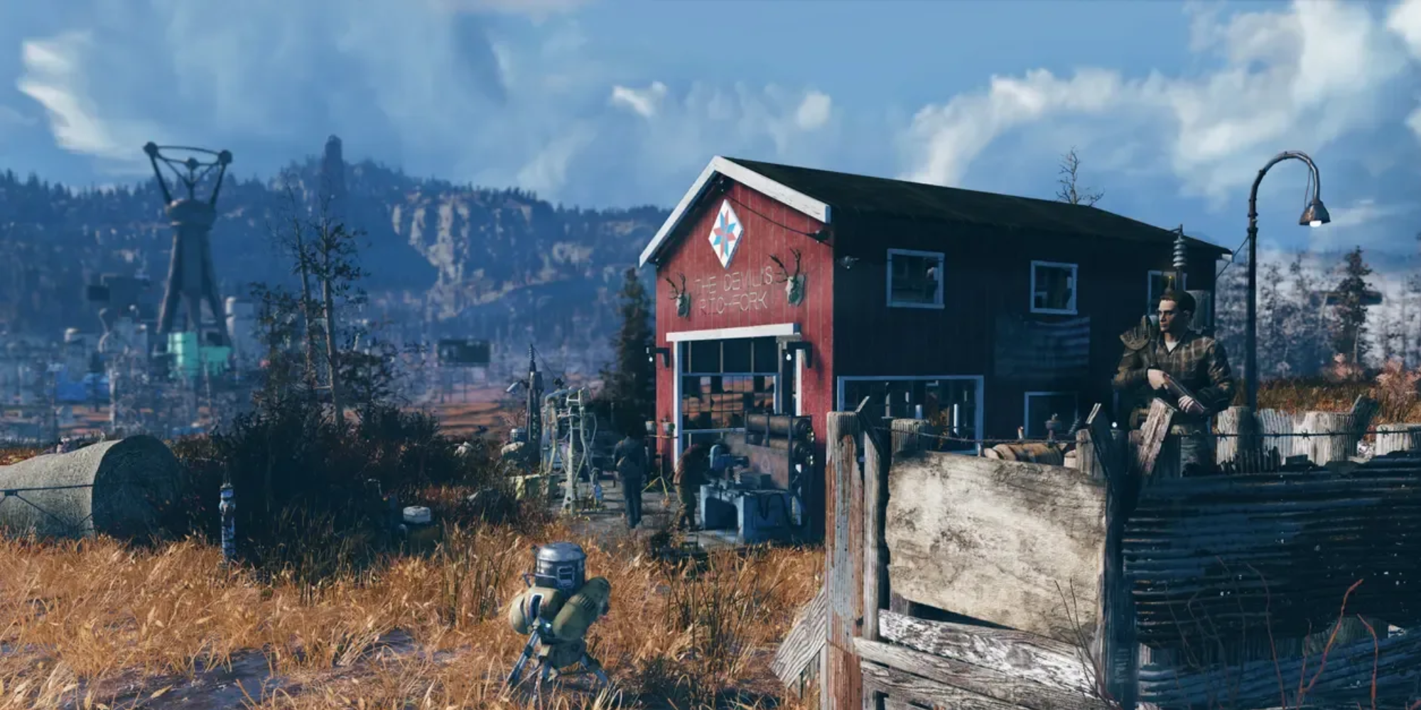 A barn and mountain-range from Fallout 76