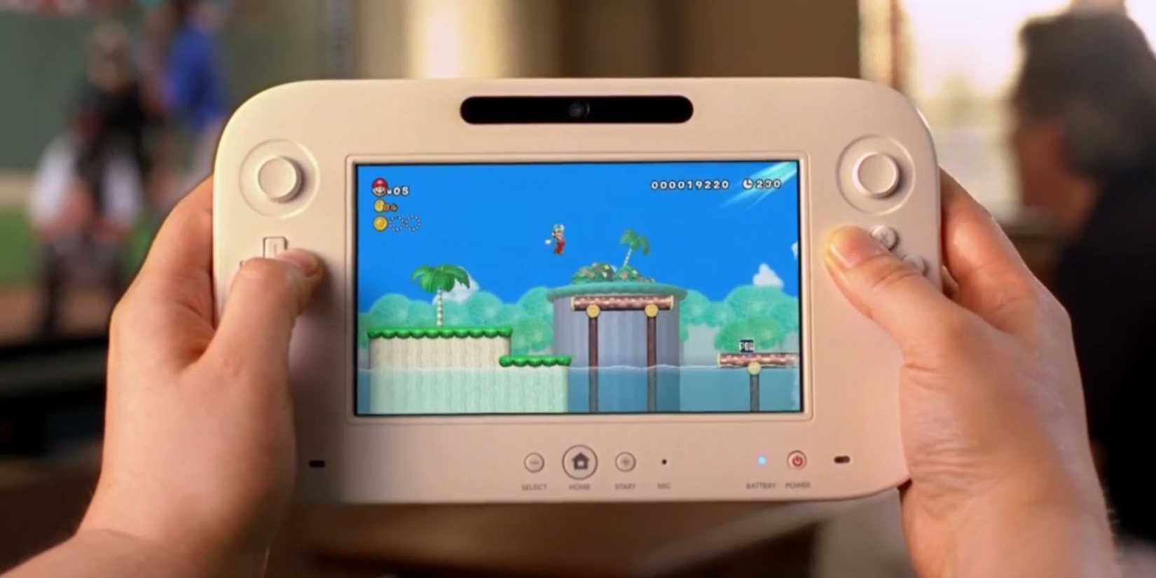 Someone playing New Super Mario Bros Wii U from the Wii U concept trailer.