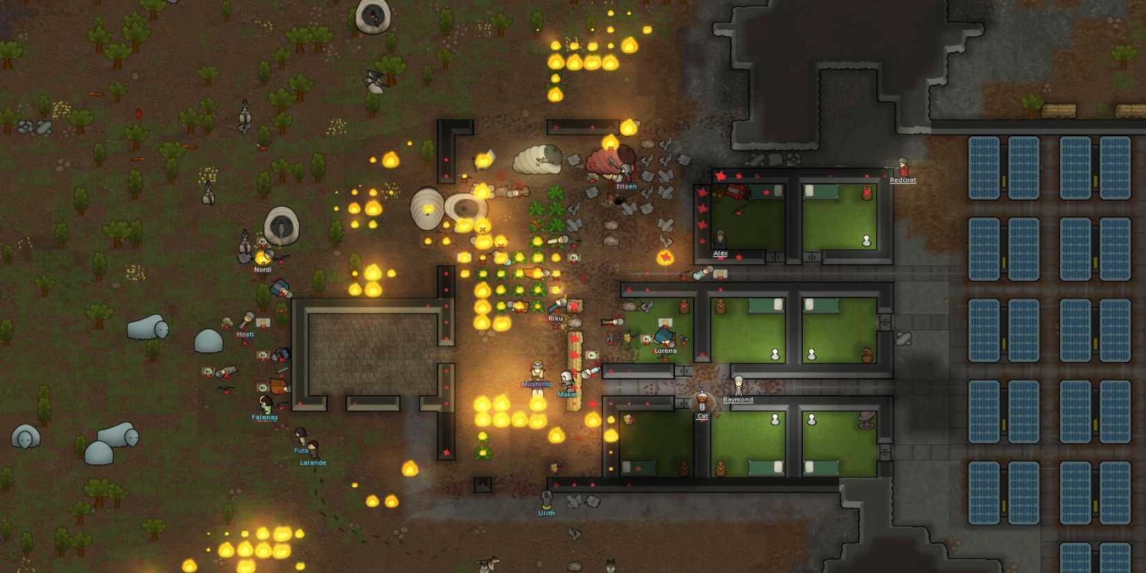A RimWorld base on fire.