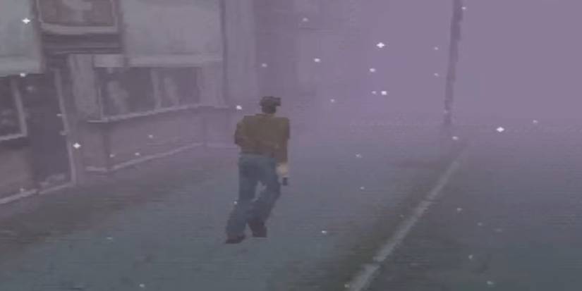 Harry runs through town in Silent Hill
