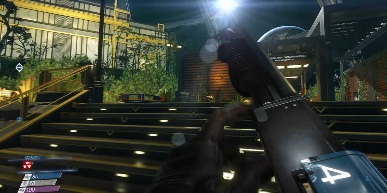 Morgan Yu holding a gun in Prey (2017).