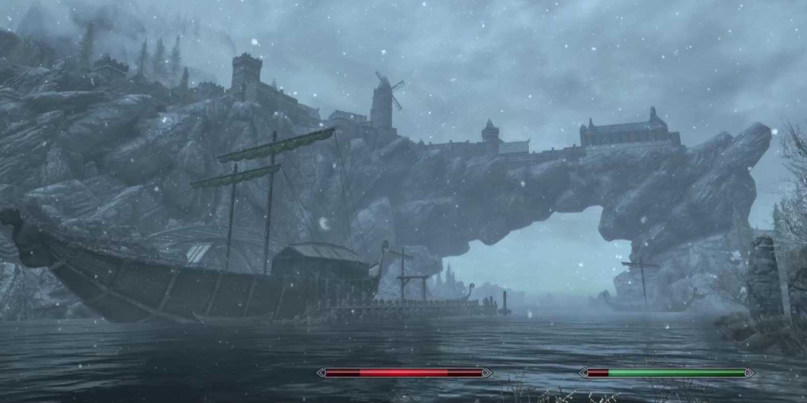 As the snow falls, Solitude sits on a rocky outcrop in Skyrim's river.