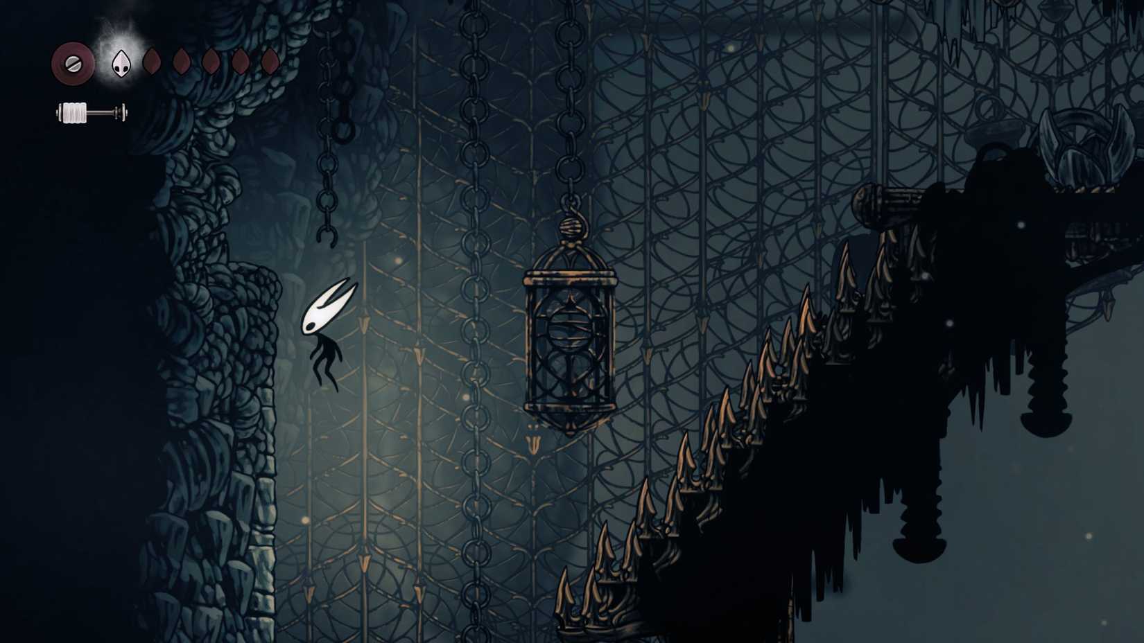 Secret entrance on The Slab Wall in Silksong.