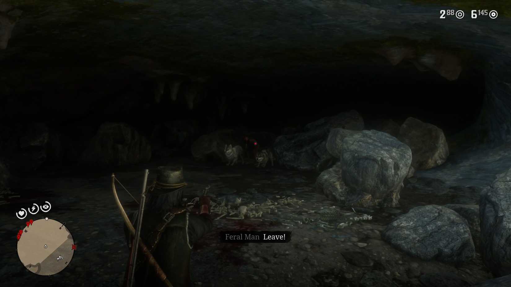 John Marston Looking at the Feral Man and Two Wolves in a Cave in Red Dead Redemption 2