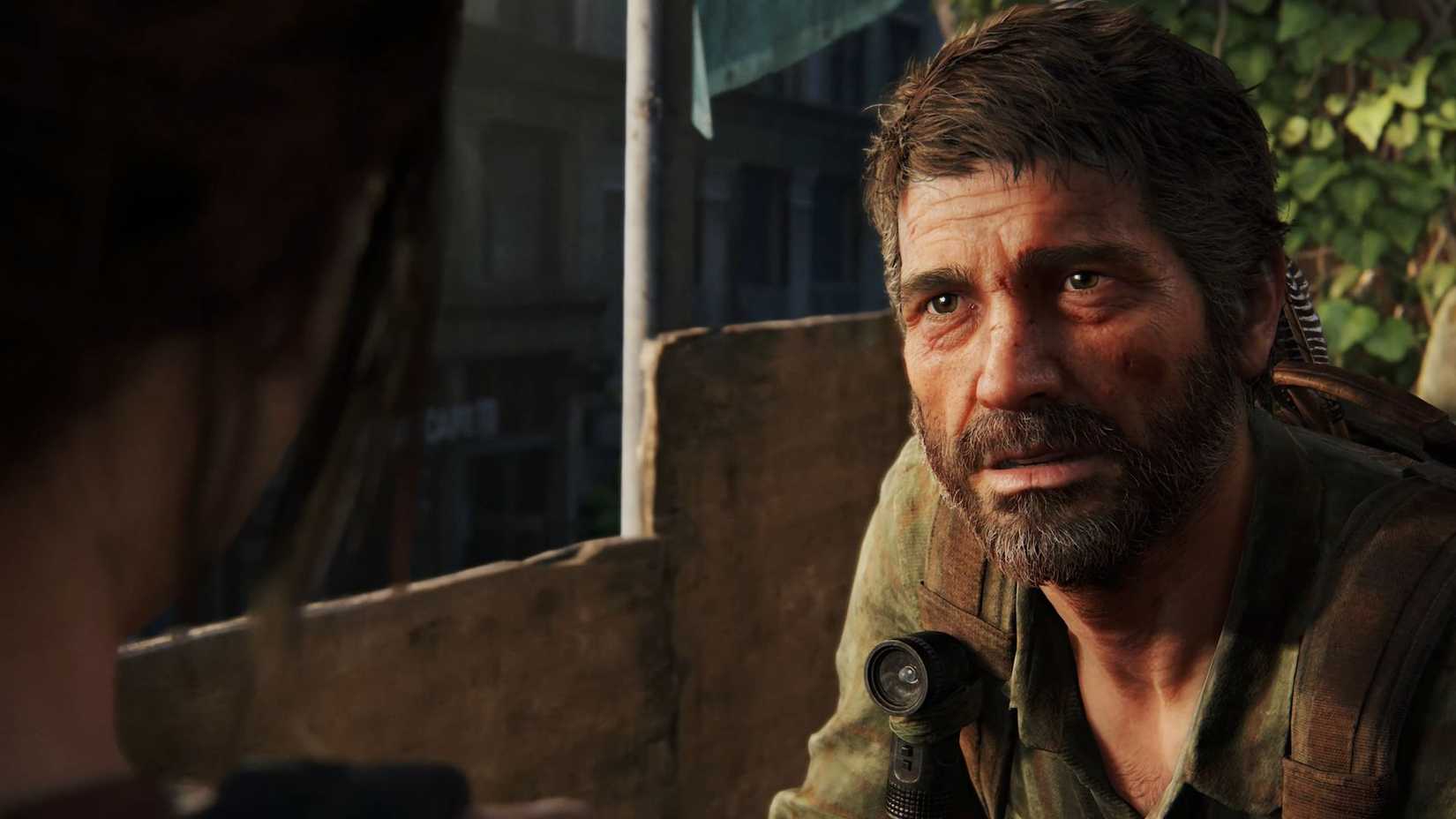 The Last of Us Joel looks at Ellie